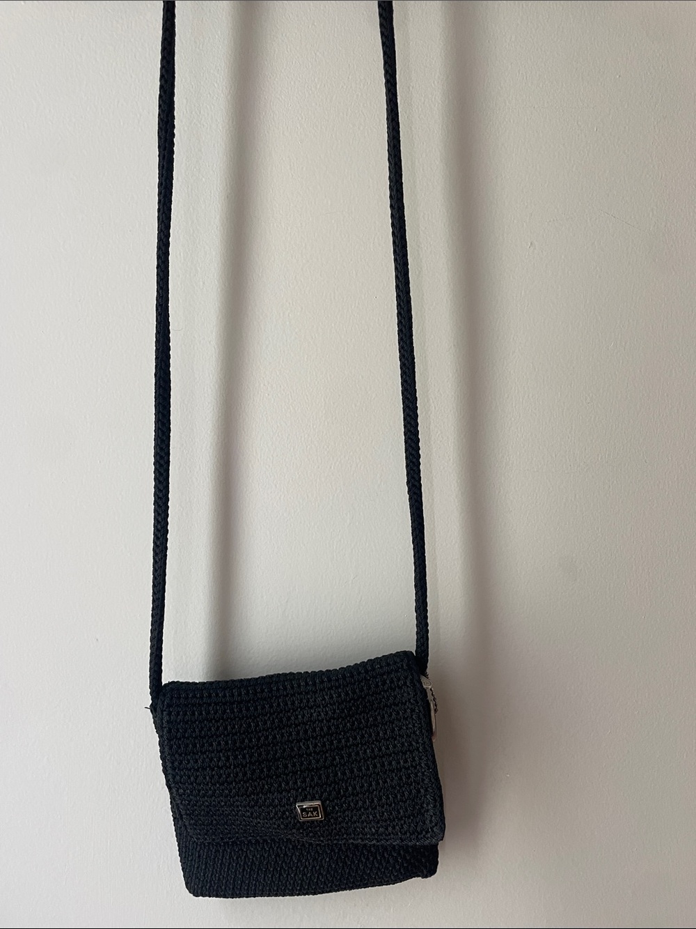 The Sak Black Crochet Crossbody Bag with Braided Strap